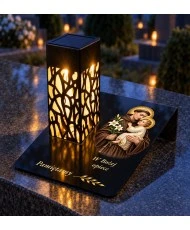 Gięty Święty Antoni z Dzieciątkiem — na nagrobku wieczorem